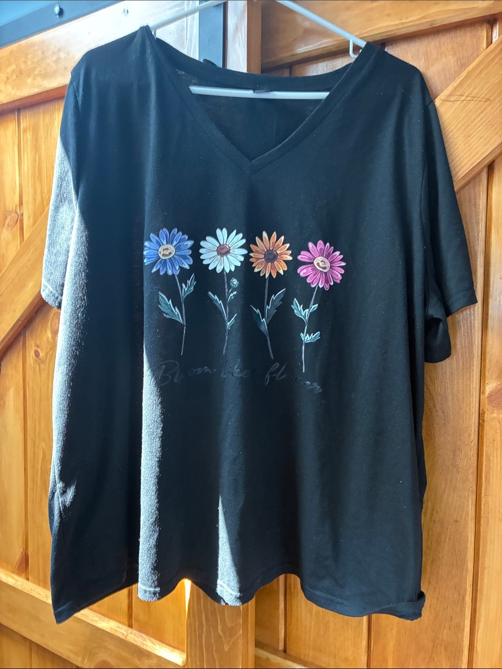 Black Women's V-Neck Tee with Colorful Daisy Print